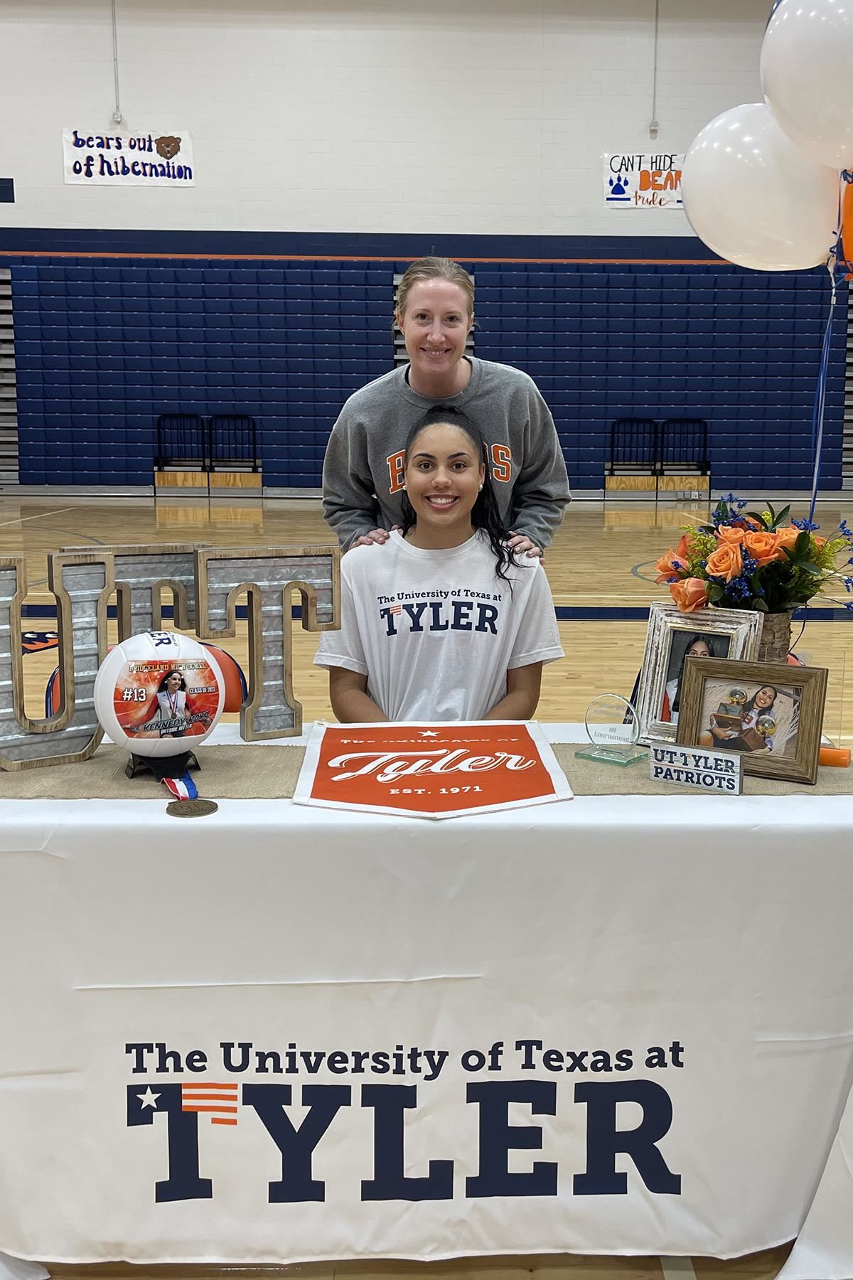 Bridgeland senior Kennedy Kays, seated, signed her letter of intent to play volleyball at the University of Texas at Tyler.
